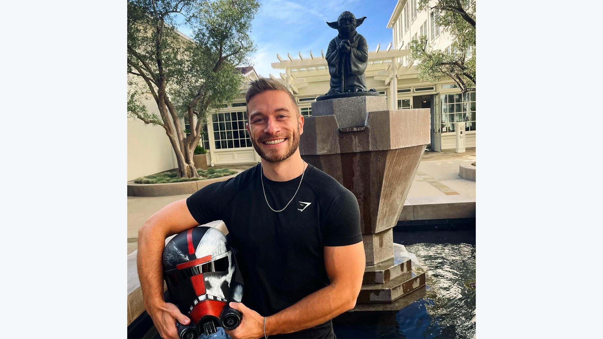 Senior animator Greg Verreault outside Lucasfilm headquarters at the Yoda fountain.