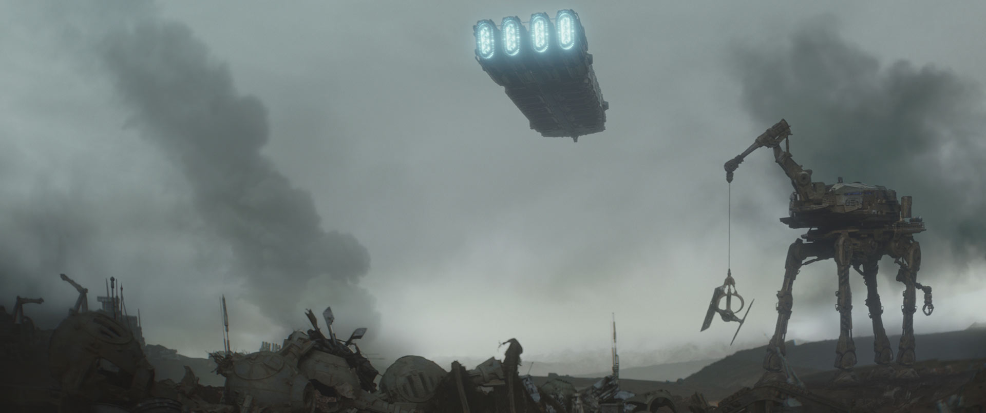 A walker lifts fragments of Imperial TIE fighters with its claws.